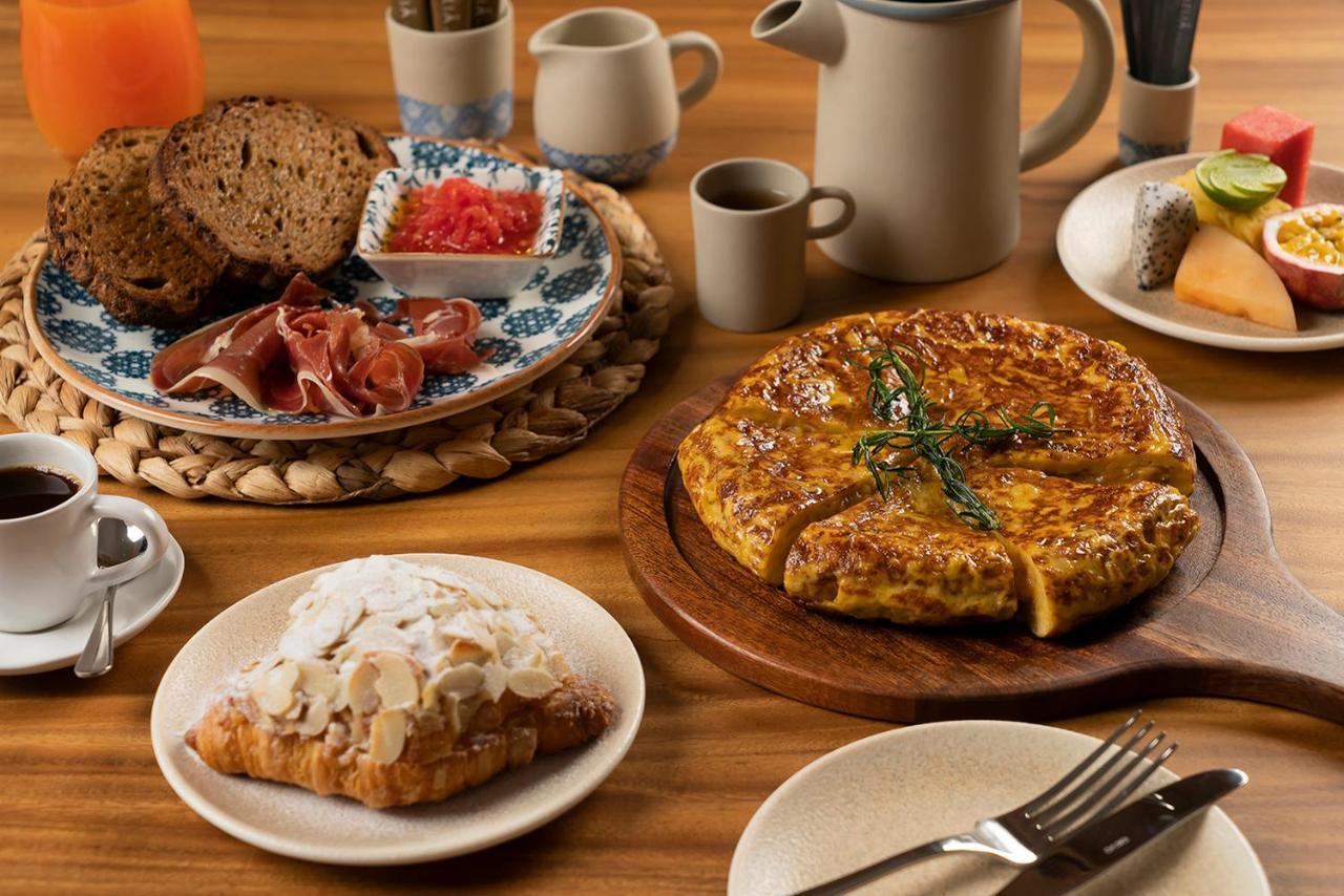 Hotel Melia Chiang Mai Esterno foto A Spanish breakfast