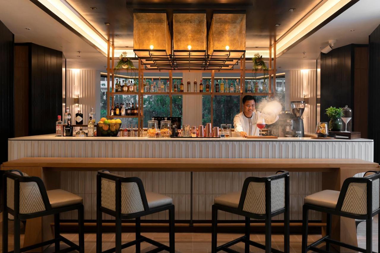 Hotel Melia Chiang Mai Esterno foto The bar at the hotel